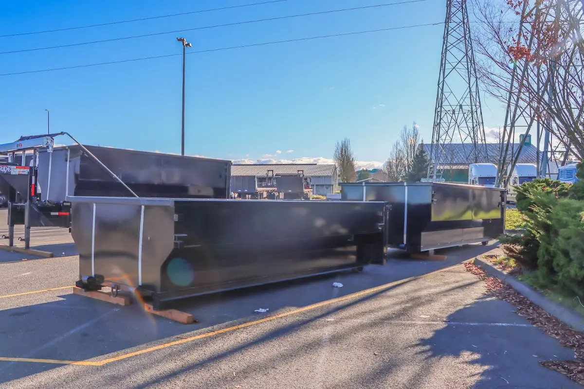 Roll-off dumpster ready for waste disposal at job site for Construction Dumpster Rental in Oak Grove